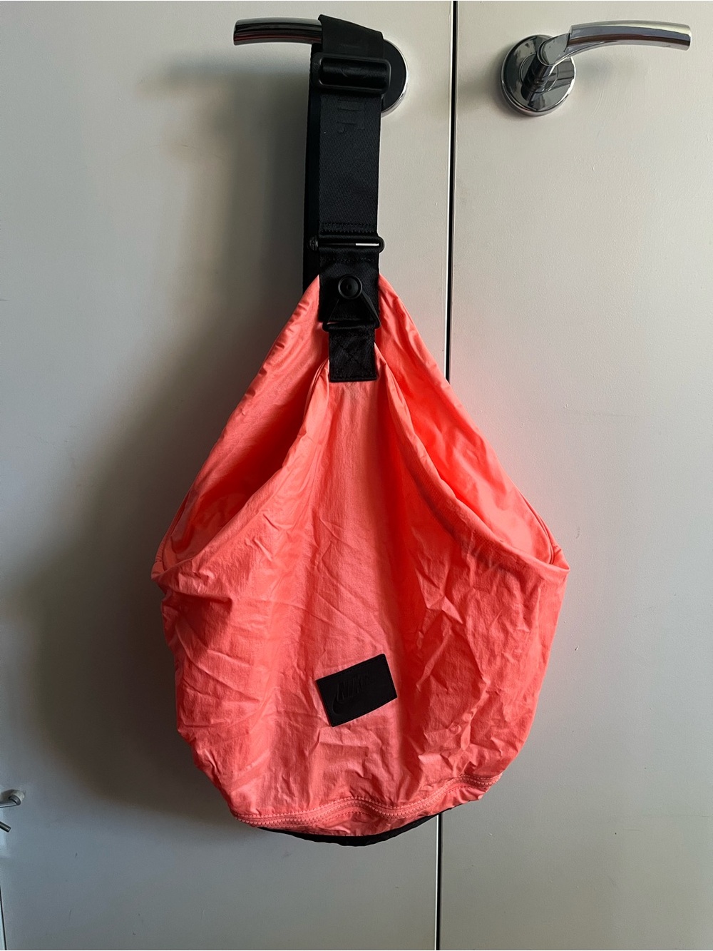 Nike Men’s Coral Pink Drawstring Sling Bag with Black Strap